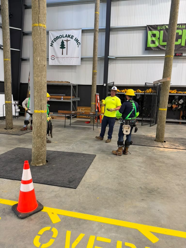 Indoor training bay with an OVERHEAD floor lane marking and a safety cone